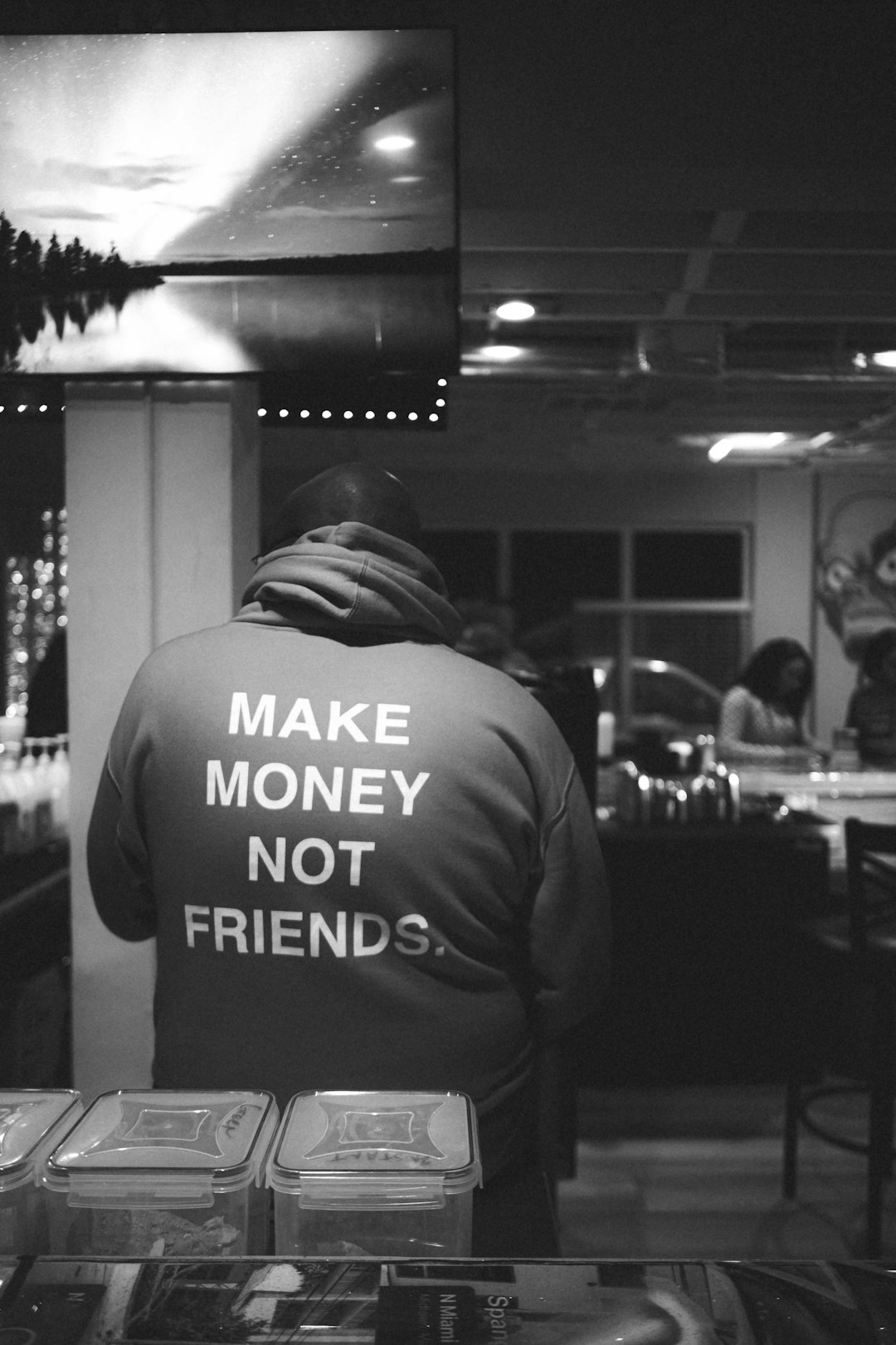 a-man-wearing-a-jacket-that-says-make-money-not-friends-hivdinopp80